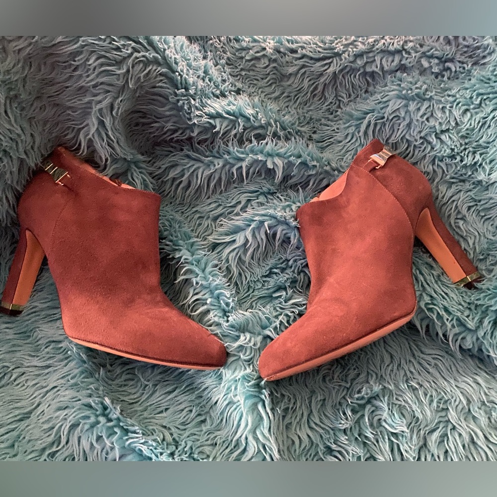 Kate Spade light suede booties with gold bow and heel accents
